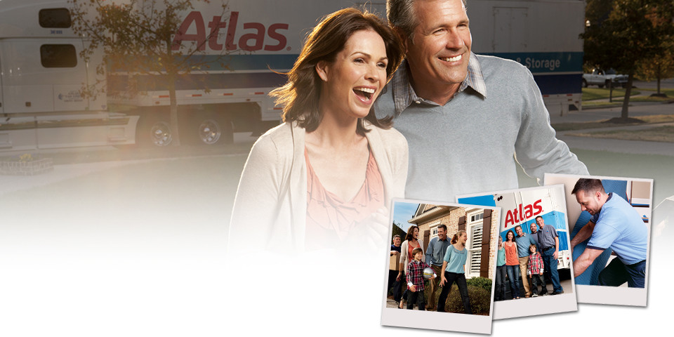 Happy couple moving with atlas truck