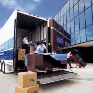 loading equipment on a moving truck